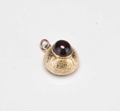 Lot 344 - A cabochon garnet locket pendant