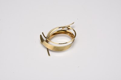 Lot 280 - A 14ct gold brooch of openwork entwined scroll form