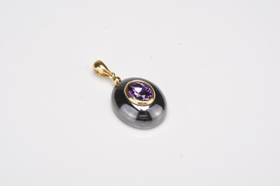 Lot 145 - An amethyst and hematite pendant