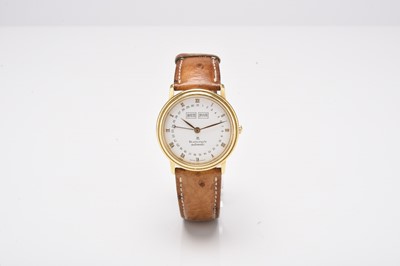 Lot 404 - Blancpain: A gentleman's 18ct gold triple calendar wristwatch