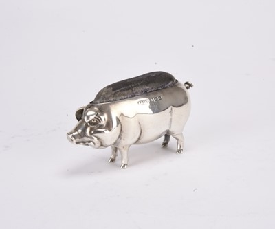 Lot 51 - A silver mounted novelty pin cushion in the form of a pig