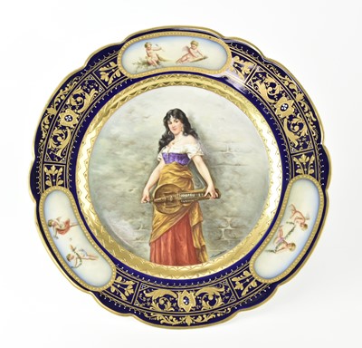 Lot 233 - A Vienna style cabinet plate, 'Das Mädchen aus der Fremde'
