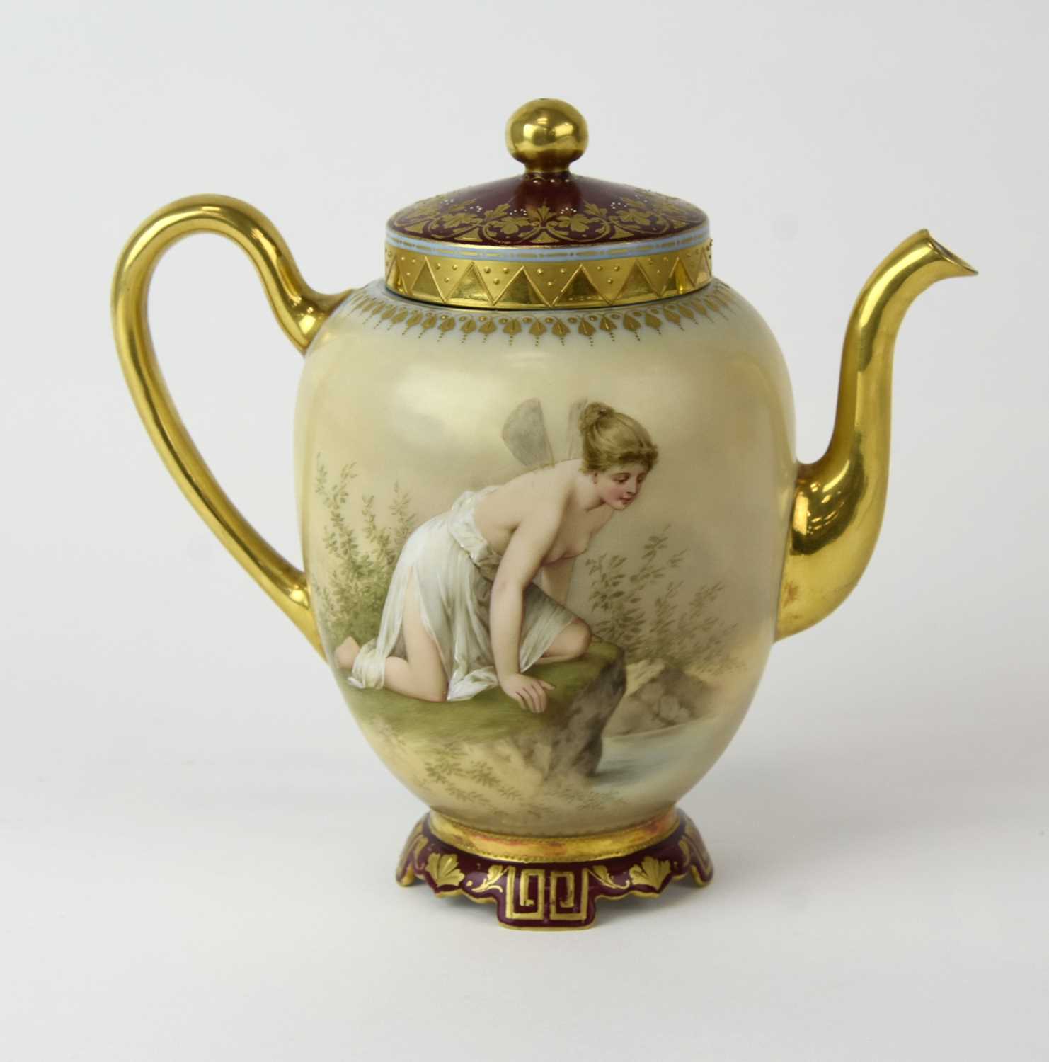Lot 241 - A small Vienna style porcelain coffee pot and cover, late 19th century
