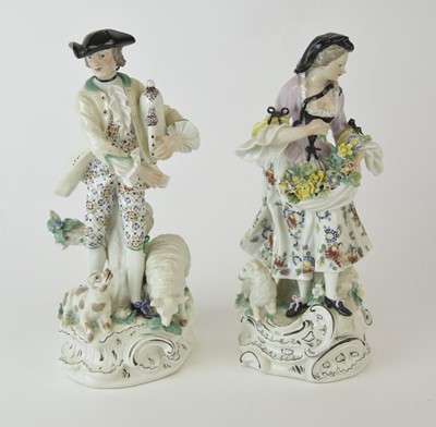 Lot 249 - A pair Continental porcelain figures of figures of shepherd and his female companion, after Bow
