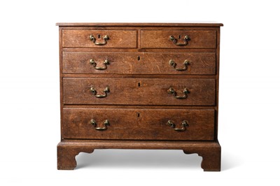 Lot 265 - A small George III oak chest of drawers