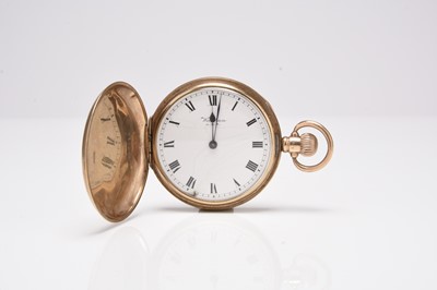 Lot 393 - Waltham: A 9ct gold hunter pocket watch