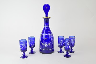 Lot 281 - A Georgian-style decanter with matching glasses, early 20th century