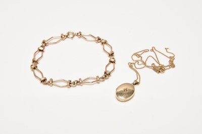 Lot 117 - A 9ct gold bracelet and a 9ct gold locket on chain