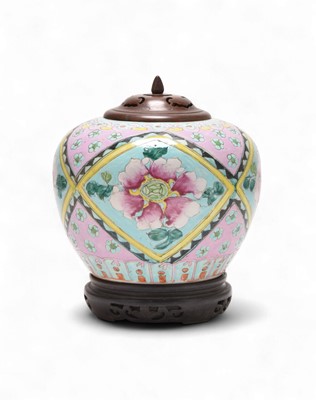 Lot 36 - A Chinese Nyonya Straits porcelain jar with wood cover and stand