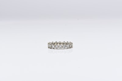 Lot 250 - A brilliant cut diamond eternity band
