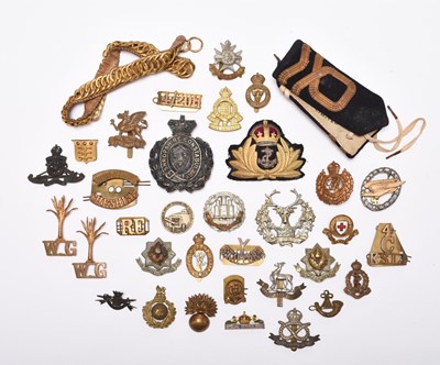 Lot 110 - Militaria including cap badges, titles, small convalescent competition medal, spare ribbon etc