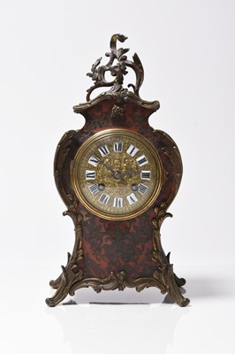 Lot 70 - A Louis XV style Boulle mantel clock