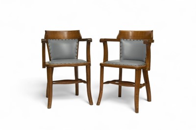 Lot 72 - A set of seven desk/captain's armchairs in oak and sky blue leatherette (7)