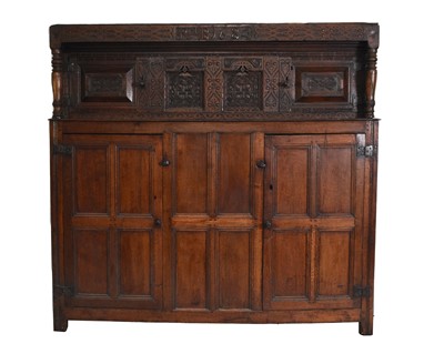 Lot 90 - A 17th century oak court cupboard