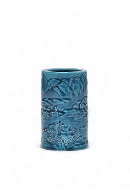 Lot 14 - A Chinese turquoise glazed and carved porcelain brush pot, Guangxu