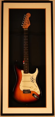 Lot 122 - Bob Dylan interest; A framed Stratocaster electric guitar
