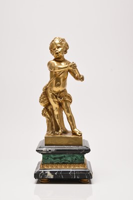 Lot 56 - A reproduction French gilt metal figure of a putti