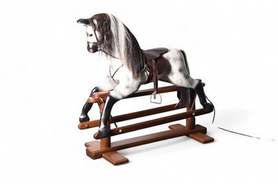 Lot 189 - A late 20th century dapple grey painted wood rocking horse