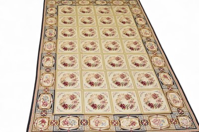 Lot 129 - A French style needlepoint rug and another smaller