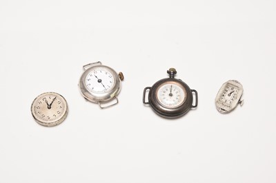 Lot 79 - Two early 20th century wristwatches and two watch movements