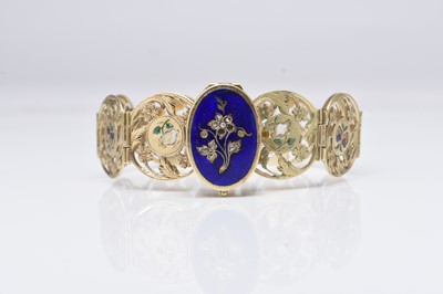 Lot 237 - A French yellow metal and enamel locket bracelet