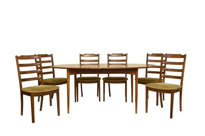 Lot 213 - A mid-20th century teak extending dining table with six dining chairs