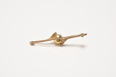 Lot 226 - A single cultured pearl and diamond bar brooch