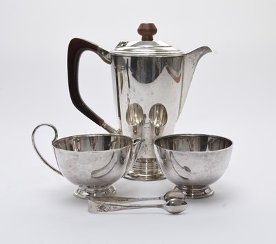 Lot 30 - A silver coffee pot, cream jug and sugar bowl