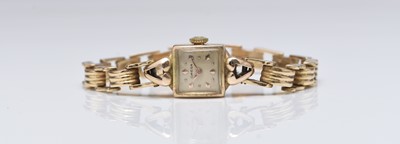 Lot Omega: A lady’s 14ct gold watch on an 18ct bracelet