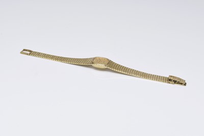 Lot 358 - Tissot: A lady’s 9ct gold Saphir bracelet watch