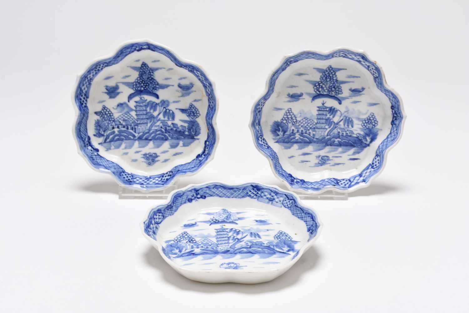 Lot 15 - Three Caughley 'Tower' pattern teapot stands, circa 1785-93
