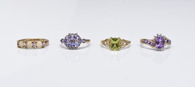 Lot 230 - Four 9ct gold rings