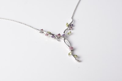 Lot 303 - A 9ct white gold gem set necklace