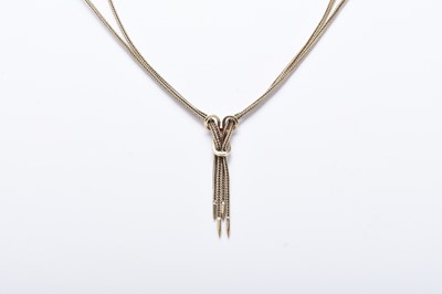 Lot 164 - A 9ct gold two strand stylised tassel necklace