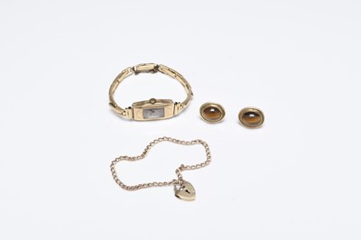 Lot 117 - A 9ct gold bracelet, a yellow metal watch and a pair of earrings