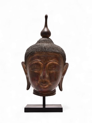 Lot 104 - A Burmese Ayutthaya style gilt lacquered head of the Buddha Shakyamuni