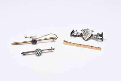 Lot 105 - Three brooches and a tie slide