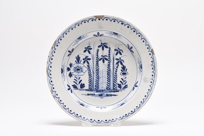 Lot 1 - English delft blue and white charger, 18th century