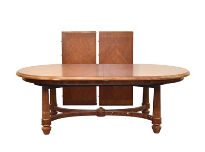 Lot 381 - A reproduction inlaid mahogany extending dining table