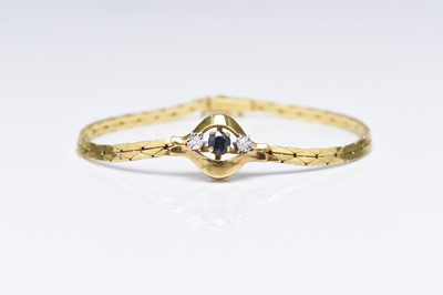 Lot 265 - A 9ct gold diamond and sapphire bracelet