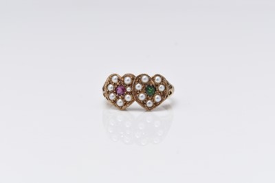 Lot 110 - A 9ct gold Victorian style ruby, emerald and seed pearl double heart ring