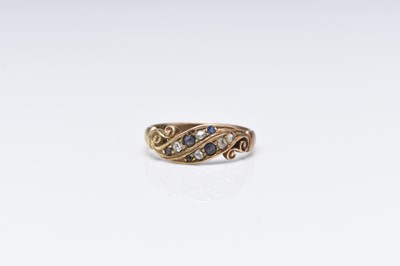 Lot 203 - A sapphire and diamond ring