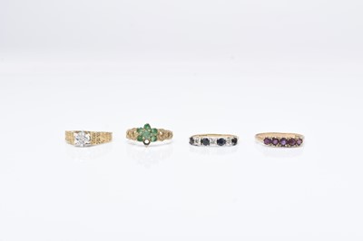 Lot 289 - Four 9ct gold stone set rings