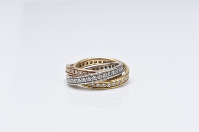 Lot 256 - A Cartier 18ct gold and diamond ‘Trinity’ ring