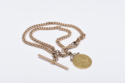 Lot 175 - A 9ct gold curb link Albert with attached George V sovereign dated 1914