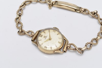 Lot 342 - Omega: A lady's 9ct gold bracelet watch