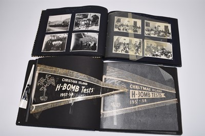 Lot 210 - Two photographs albums compiled by Sgt. L.J Arnold, RAF, including Christmas Island bomb tests