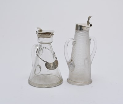 Lot 21 - A silver mounted whisky noggin and a plated mounted double spouted jug