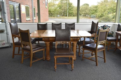 Lot 111 - A late Victorian Renaissance revival carved oak dining suite