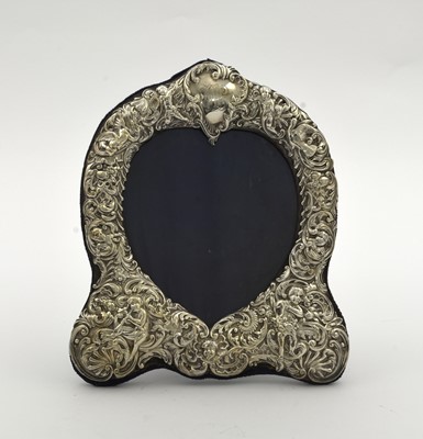 Lot 41 - A Victorian silver mounted heart shaped photograph frame